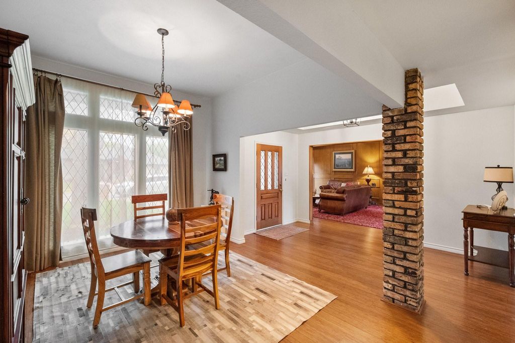Dining Room with Exposed Brick Column