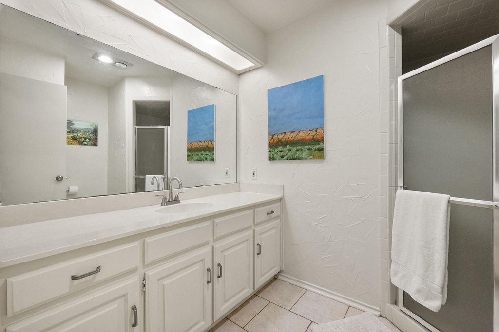 Long Quartz Vanity with Mirror & Step-In Shower