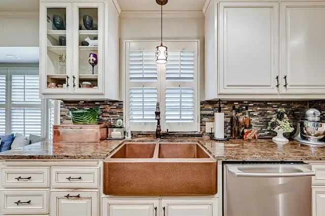 Cream Cabinets with Copper Farmhouse Sink