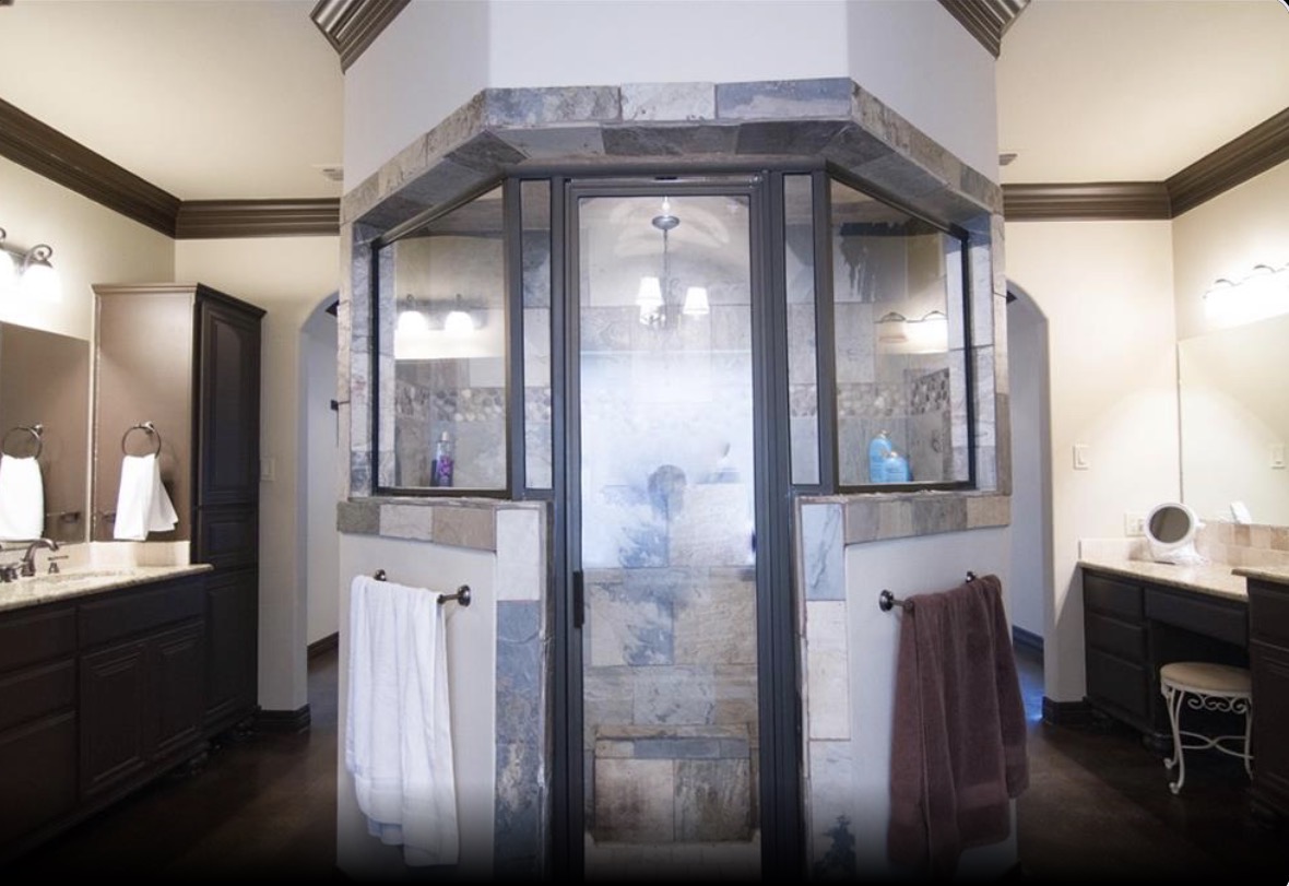 Master bathroom with custom stone walk-through shower
