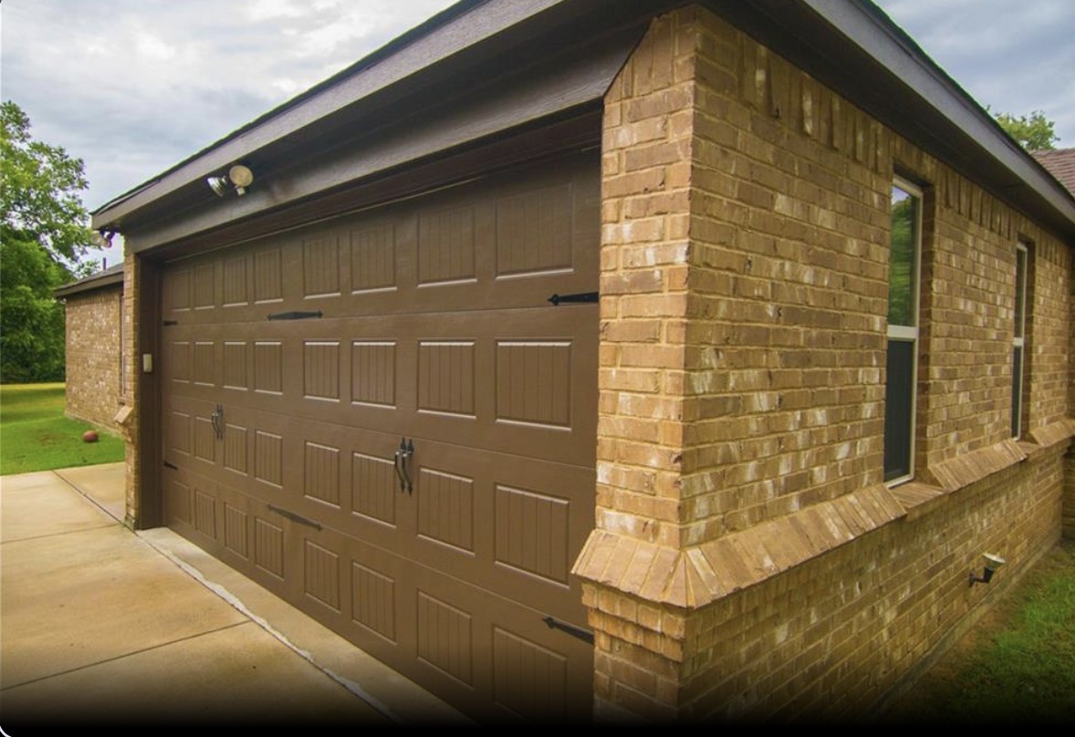 Brick Home with New Garage Door & Paint