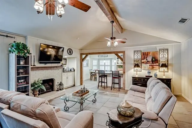 Open Living Room with Wood Beams & Built-Ins