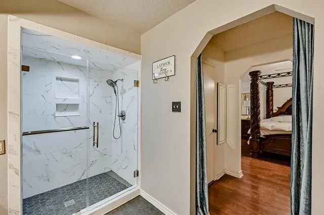 Marble Walk-In Shower with Glass Enclosure